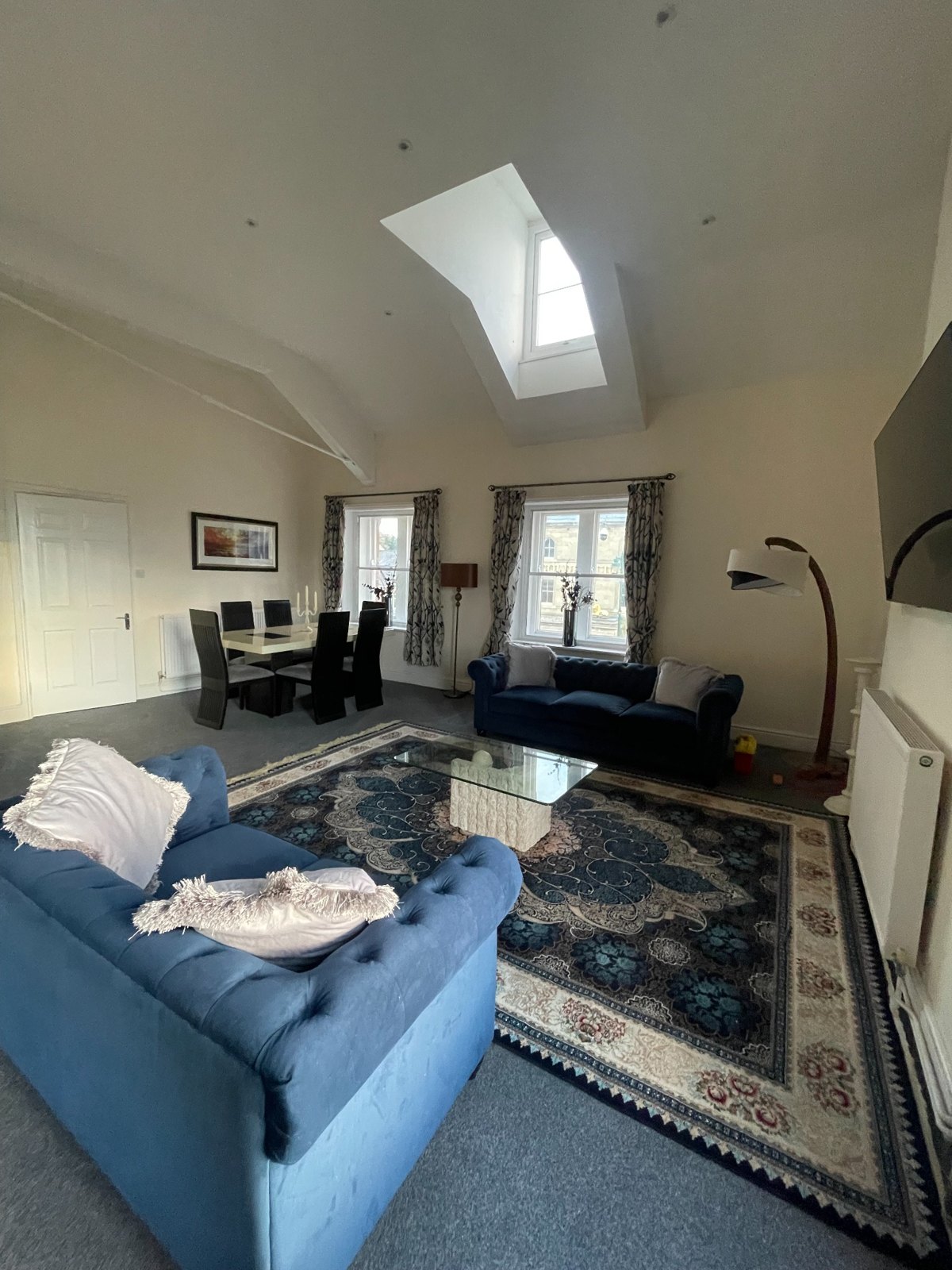 Living room with blue sofas