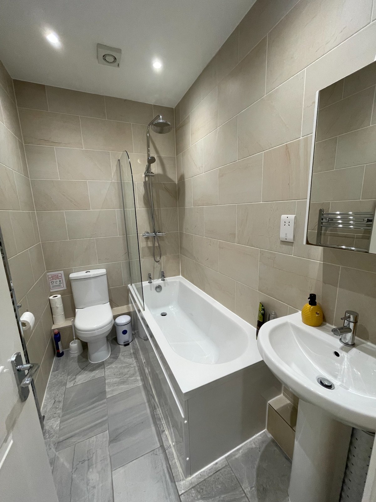 Bathroom with bath and shower