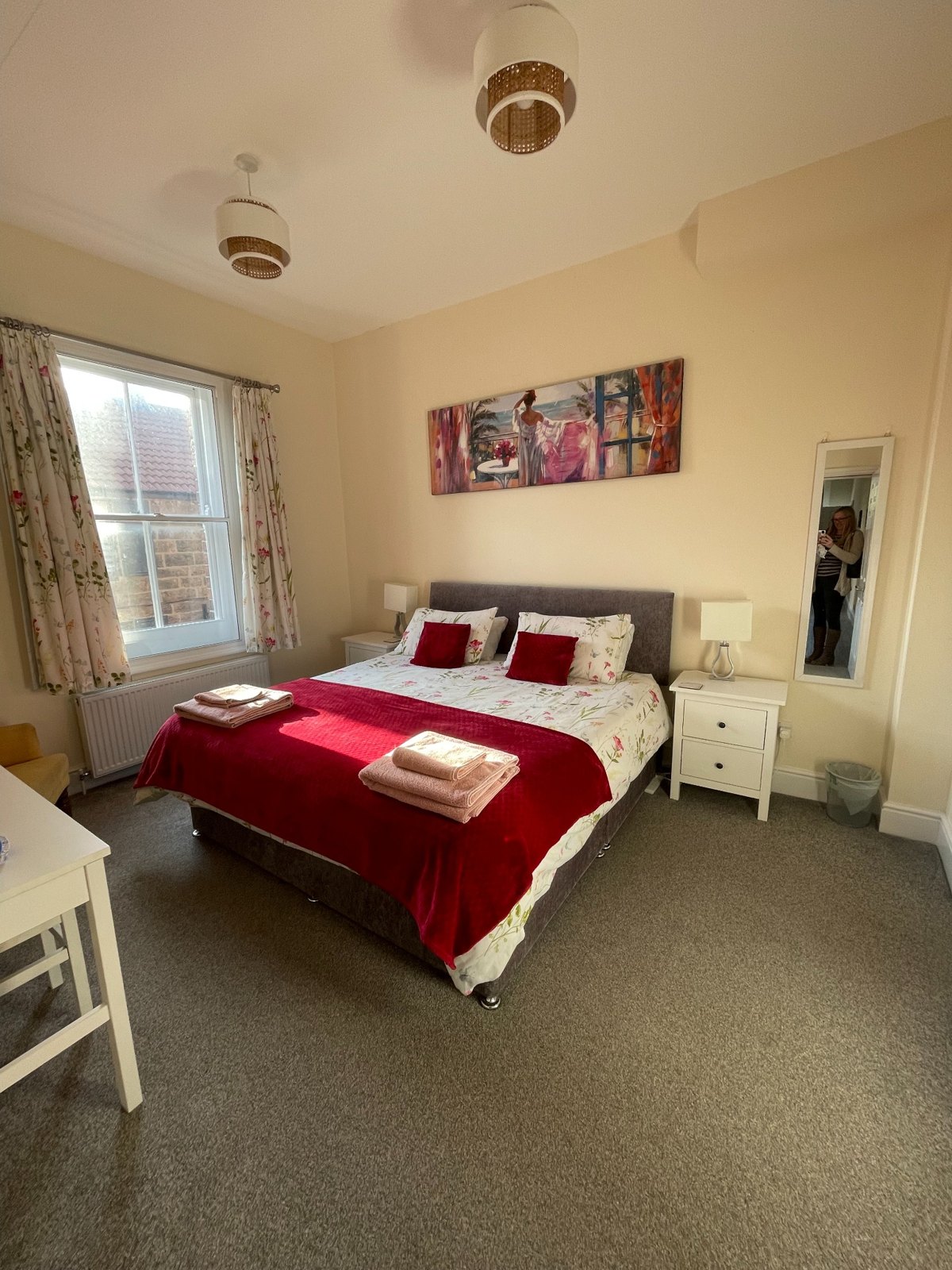 Double bedroom with red bedding